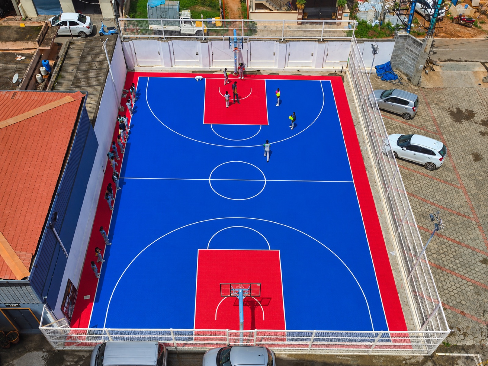 Aerial view of a completed basketball court in use